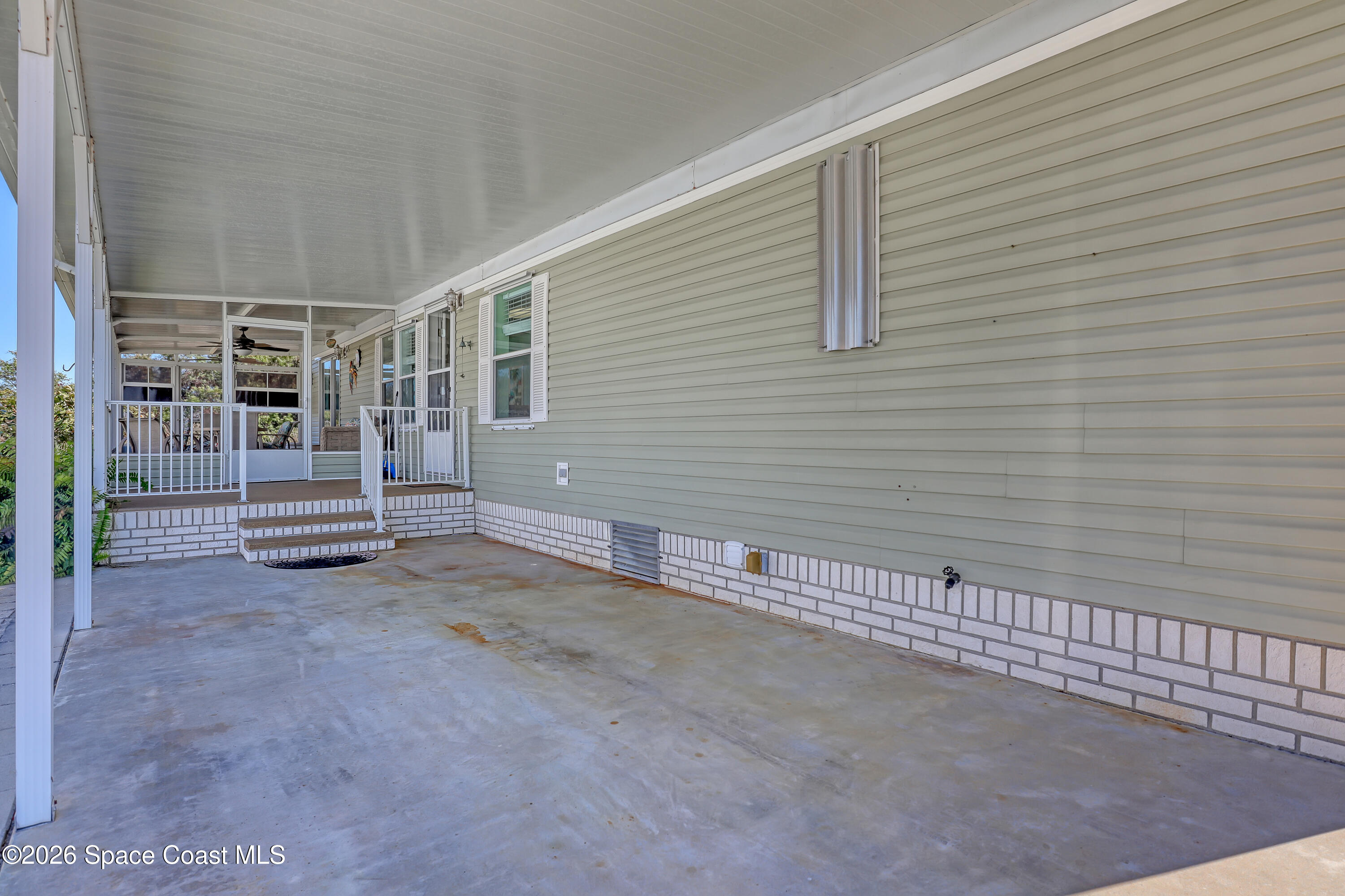 7547 Boxelder Road Micco, FL 32976 - Photo 4 of 53 a view of an empty room
