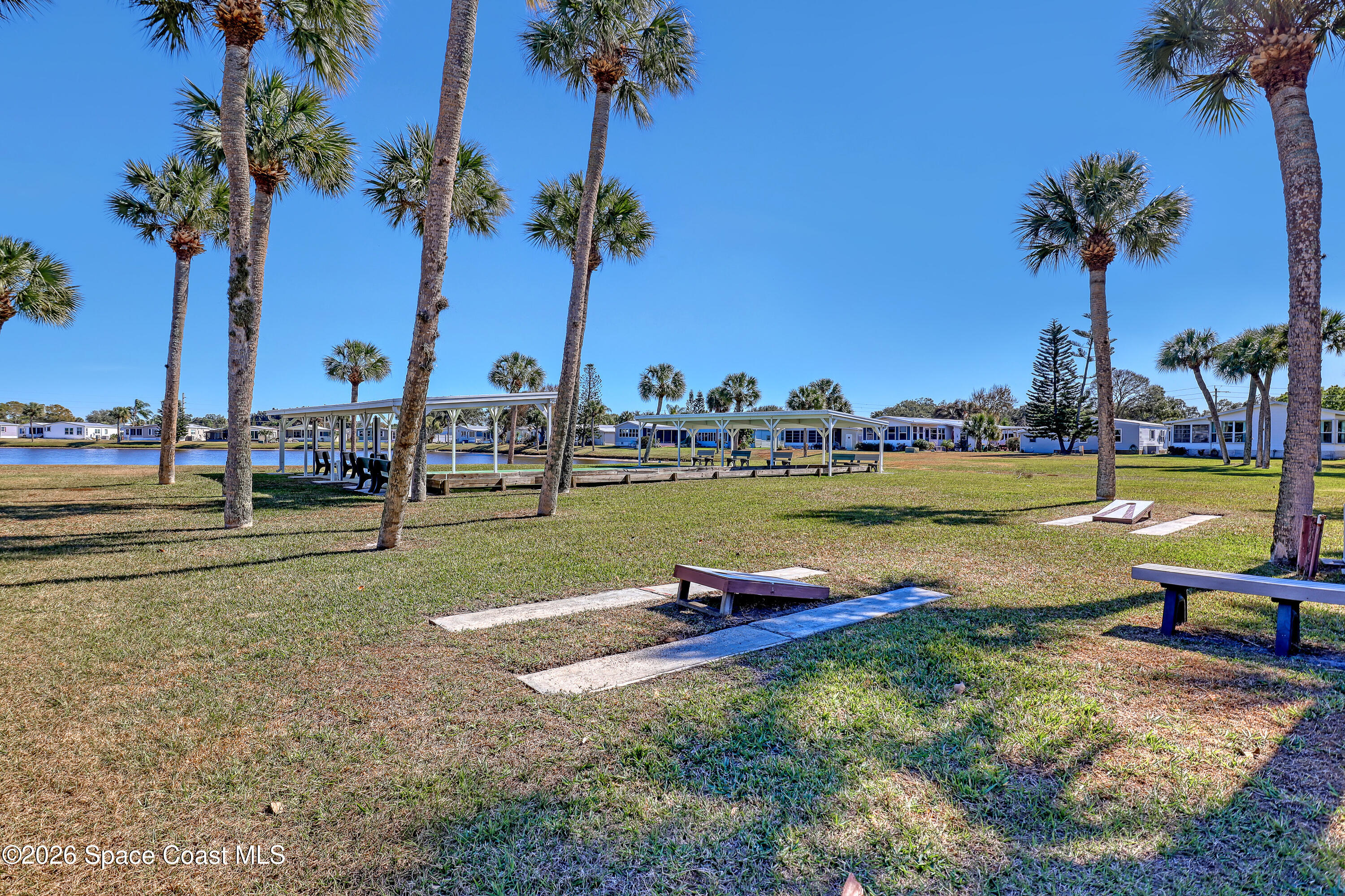 7547 Boxelder Road Micco, FL 32976 - Photo 51 of 53 a view of a water with palm trees