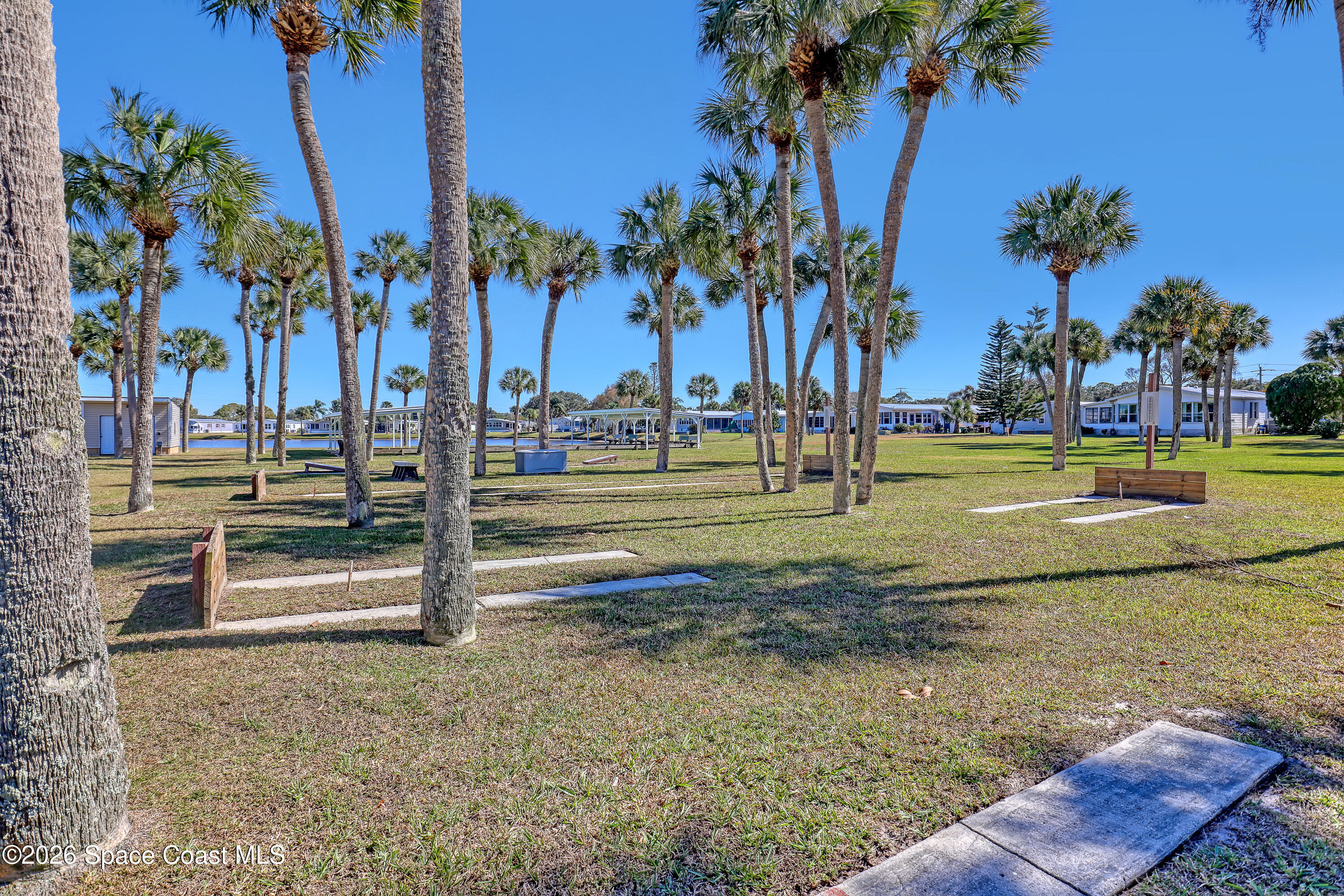 7547 Boxelder Road Micco, FL 32976 - Photo 52 of 53 a view of a park with palm trees