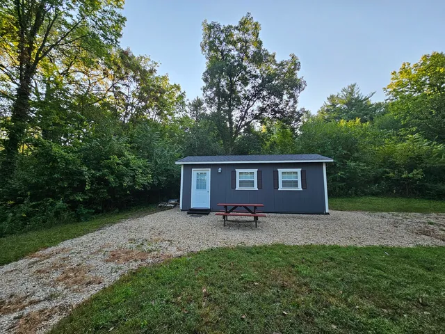 a house view with a backyard space