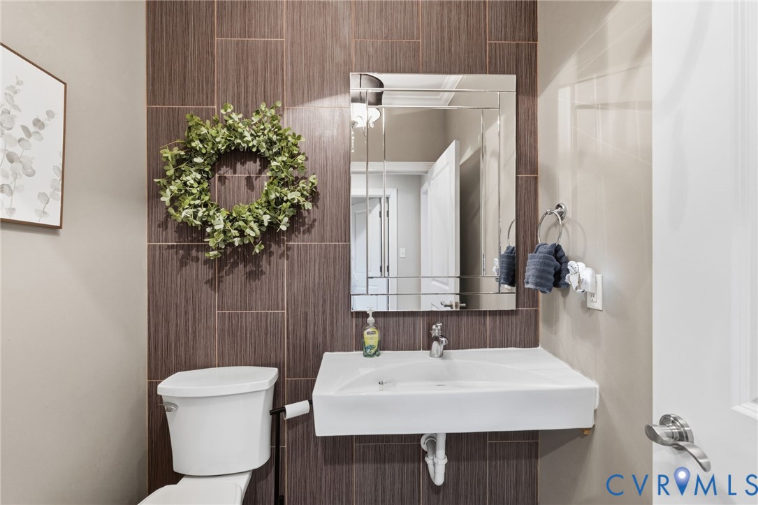 15220 River Road Chesterfield, VA 23838 - Photo 23 of 65 Wall-mounted sink with chrome faucet, set against