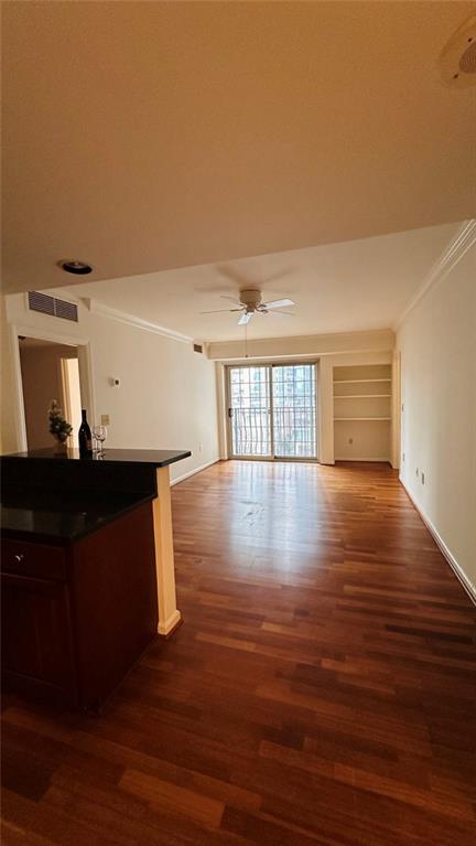 199 14th Street Northeast, Unit 507 Atlanta, GA 30309 - Photo 14 of 26 a view of a room with wooden floor
