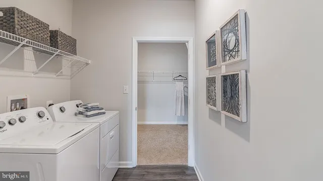 a storage room with washer and dryer