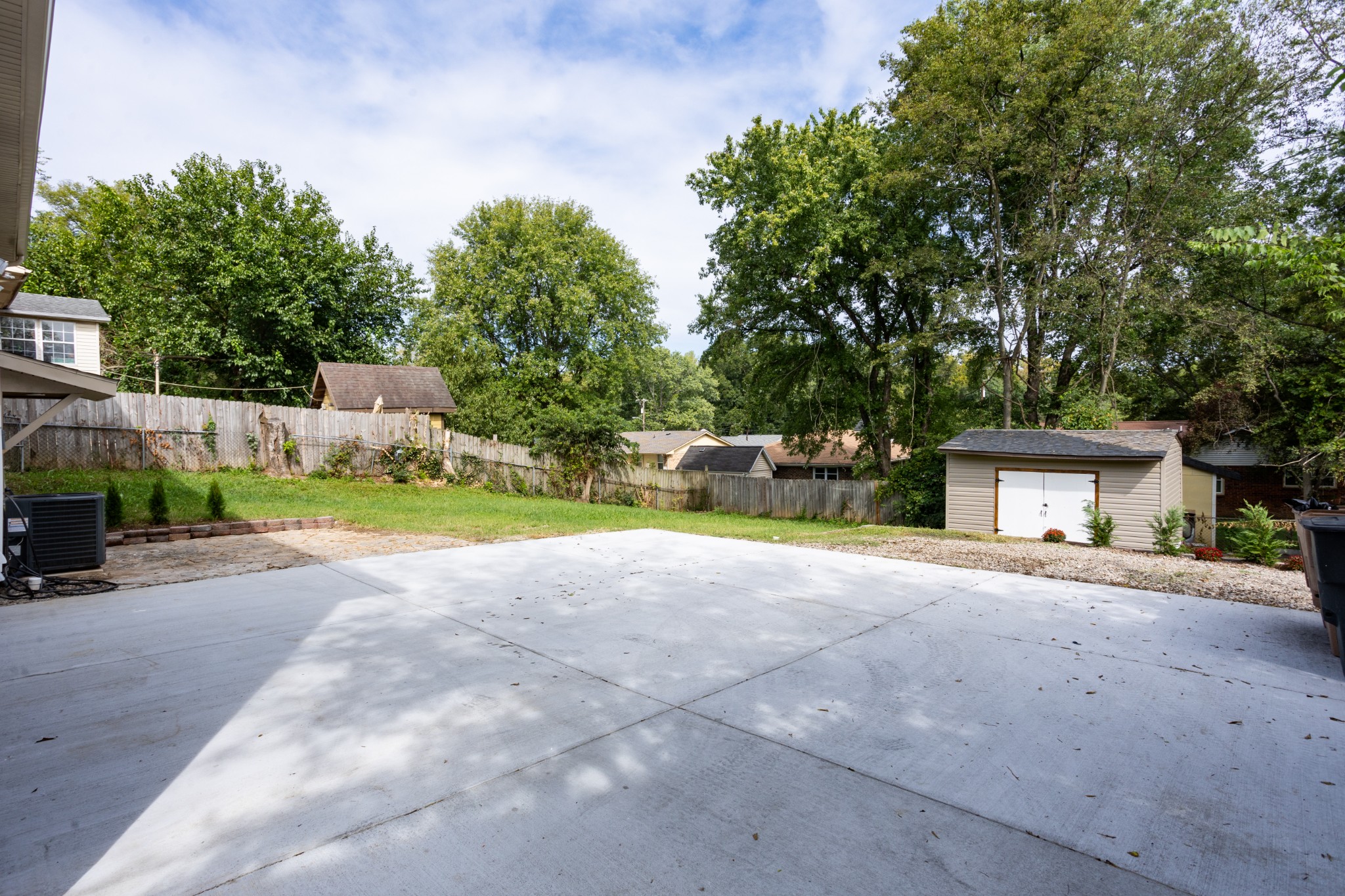 34 Tusculum Road Antioch, TN 37013 - Photo 54 of 55 a front view of a house with a yard and garage