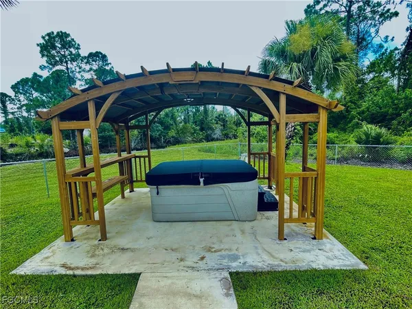 a view of outdoor space yard deck patio and outdoor kitchen