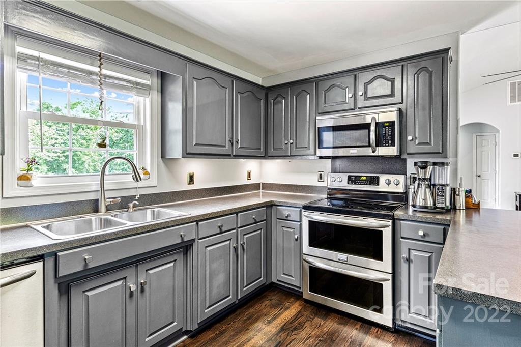 1776 Furnace Road Lincolnton, NC 28092 - Photo 12 of 41 a kitchen with a sink stove and microwave