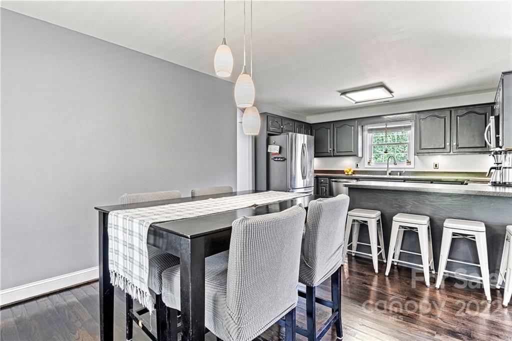 1776 Furnace Road Lincolnton, NC 28092 - Photo 15 of 41 a kitchen with a table and chairs in it