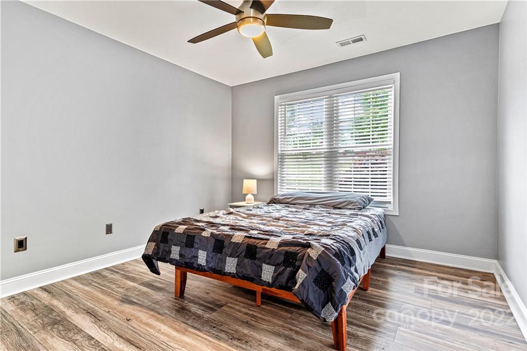 1776 Furnace Road Lincolnton, NC 28092 - Photo 24 of 41 a bedroom with a bed and window