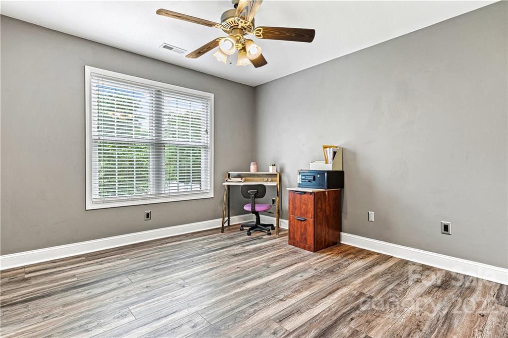 1776 Furnace Road Lincolnton, NC 28092 - Photo 27 of 41 a bedroom with furniture and a window