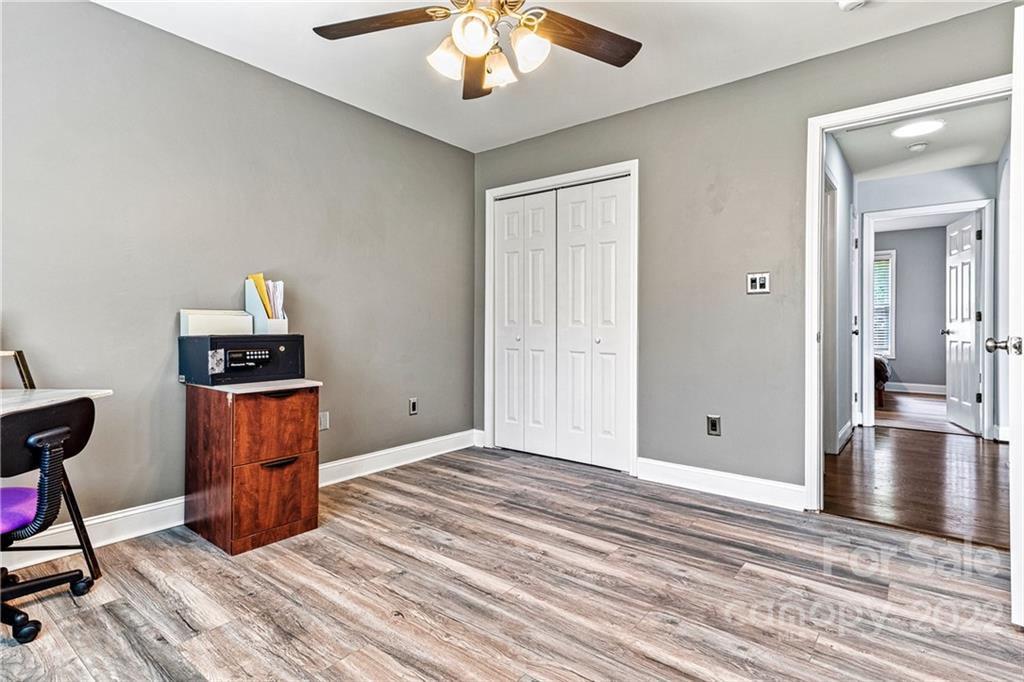 1776 Furnace Road Lincolnton, NC 28092 - Photo 28 of 41 a room view with a wooden floor and ceiling fan
