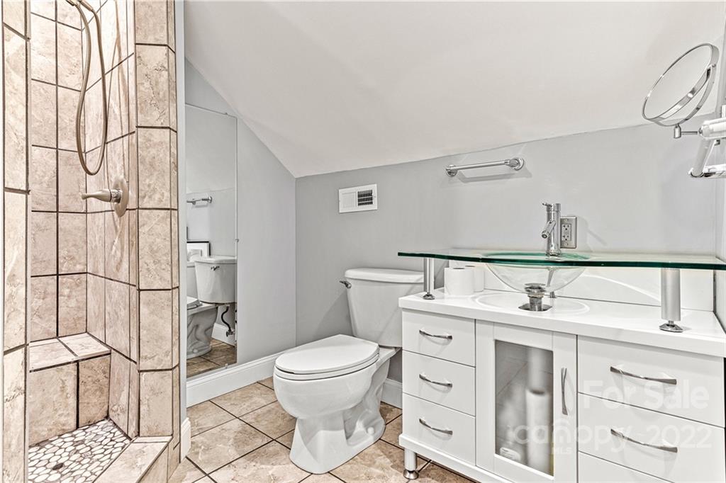 1776 Furnace Road Lincolnton, NC 28092 - Photo 33 of 41 a bathroom with a toilet sink and shower