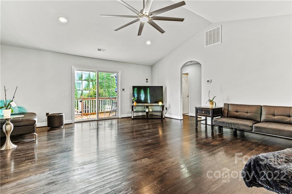 1776 Furnace Road Lincolnton, NC 28092 - Photo 6 of 41 a living room with furniture and a flat screen tv