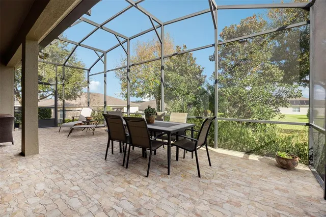 a view of outdoor space with table and chair
