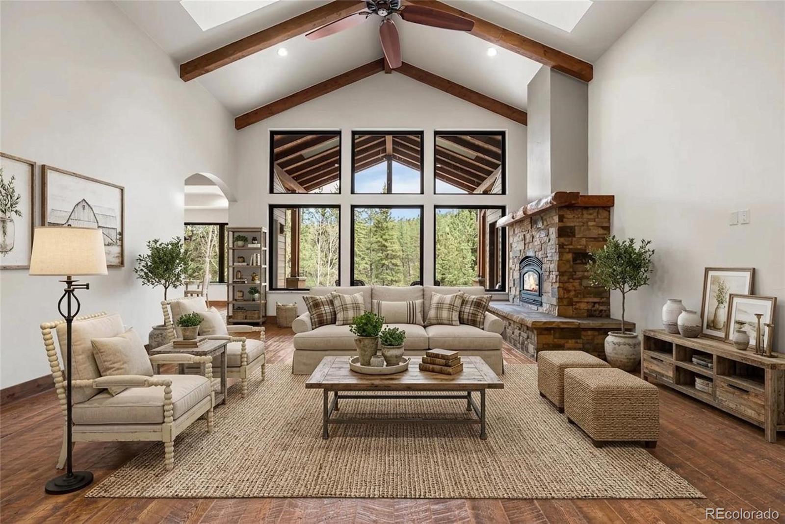 280 Double Tree Road Bailey, CO 80421 - Photo 5 of 43 a living room with furniture and a large window