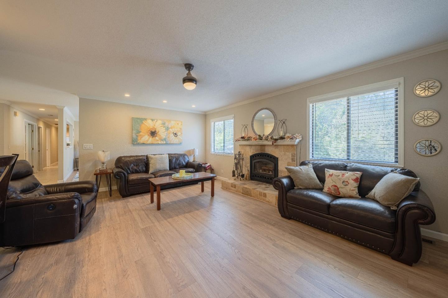 5240 Strong Circle Watsonville, CA 95076 - Photo 14 of 51 a living room with furniture a fireplace and a large window