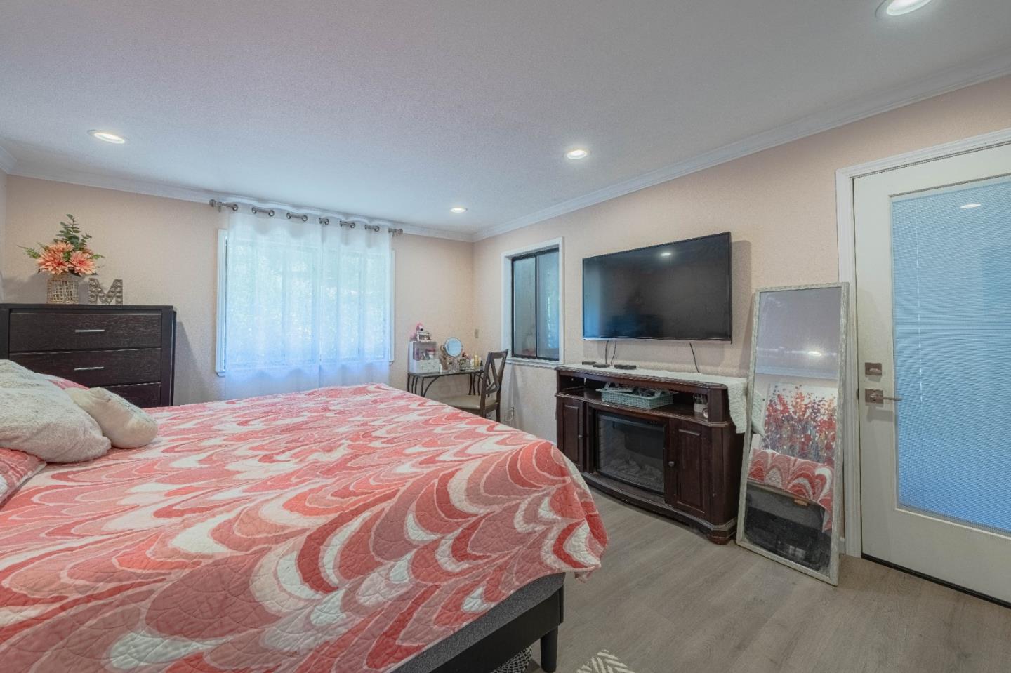 5240 Strong Circle Watsonville, CA 95076 - Photo 24 of 51 a bedroom with a bed and a flat screen tv