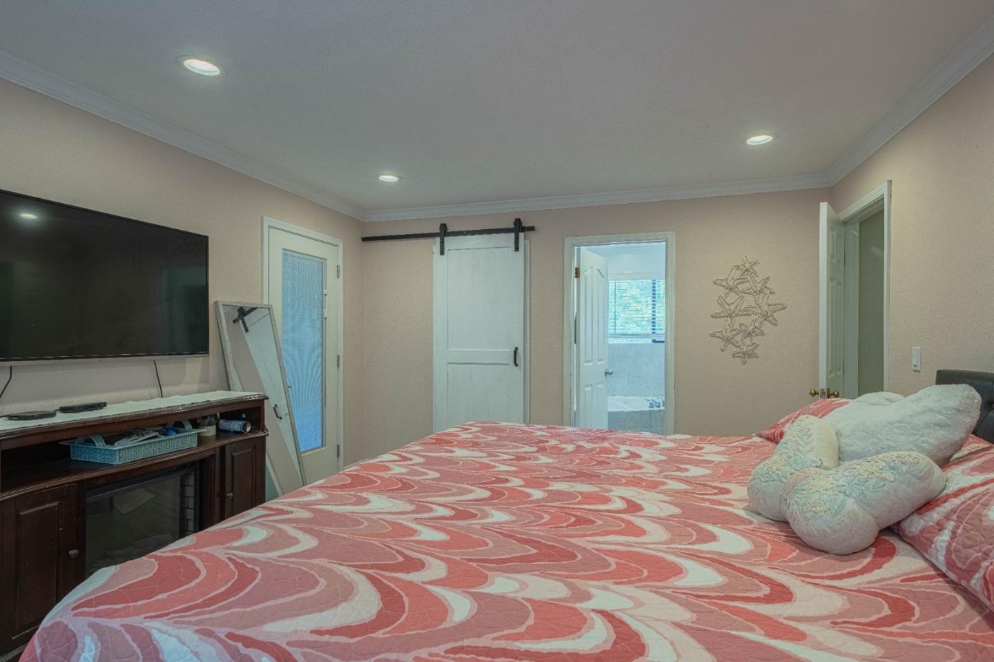 5240 Strong Circle Watsonville, CA 95076 - Photo 25 of 51 a bedroom with a bed and a flat screen tv