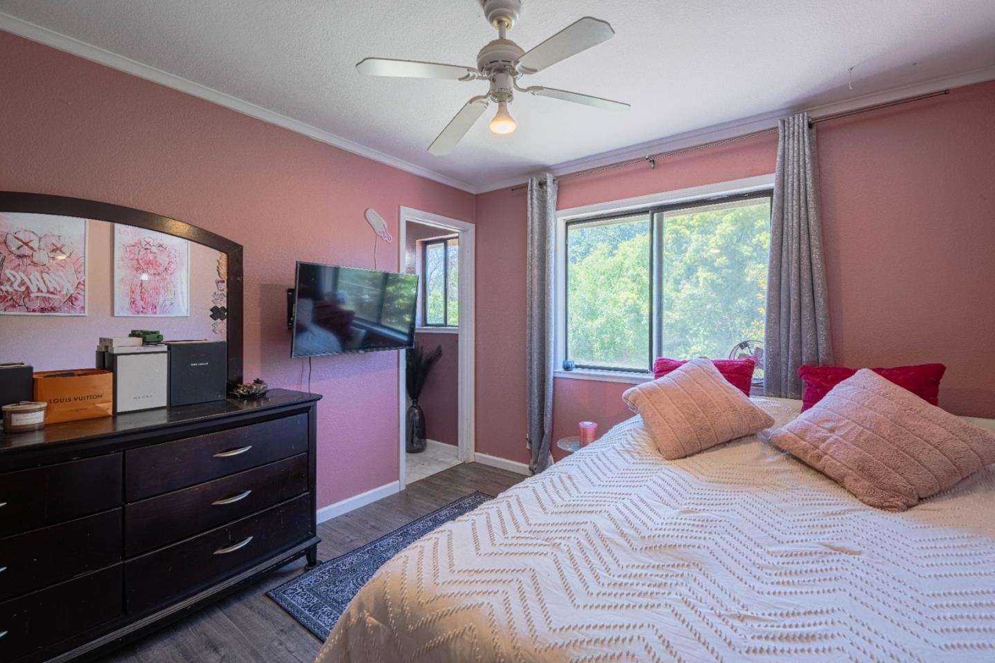 5240 Strong Circle Watsonville, CA 95076 - Photo 34 of 51 a bedroom with a bed dresser and a large window