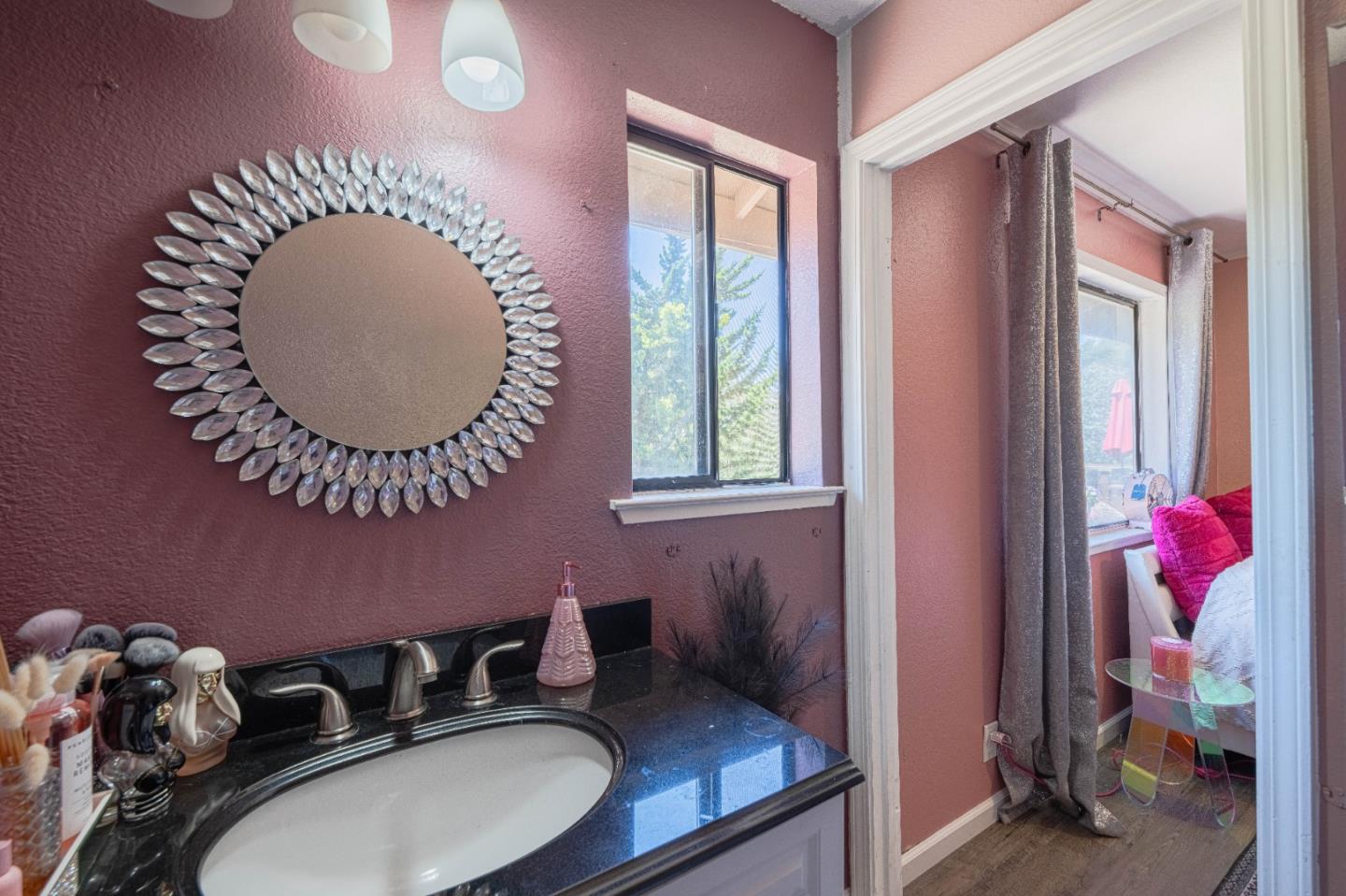 5240 Strong Circle Watsonville, CA 95076 - Photo 35 of 51 a table with chairs and a wooden floor