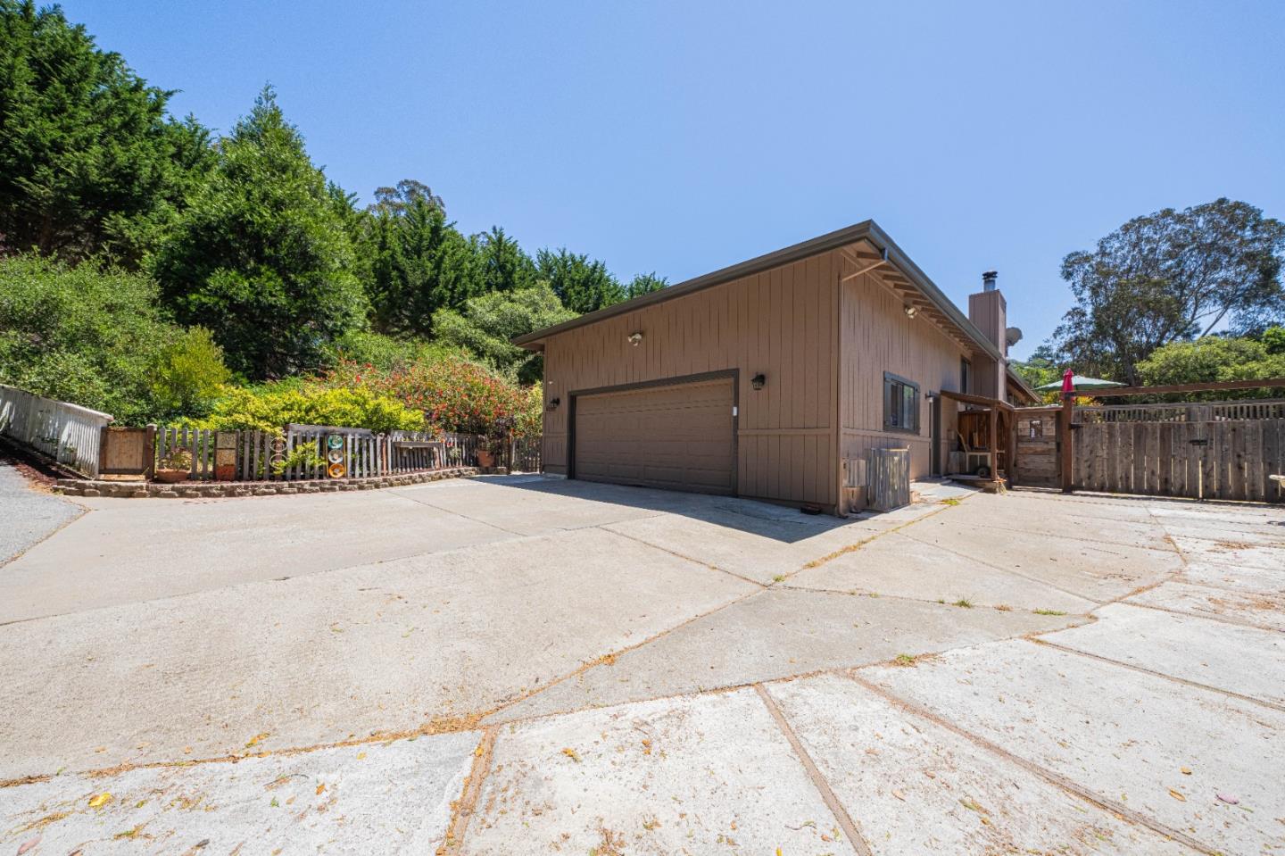 5240 Strong Circle Watsonville, CA 95076 - Photo 46 of 51 a front view of a house with a yard and garage