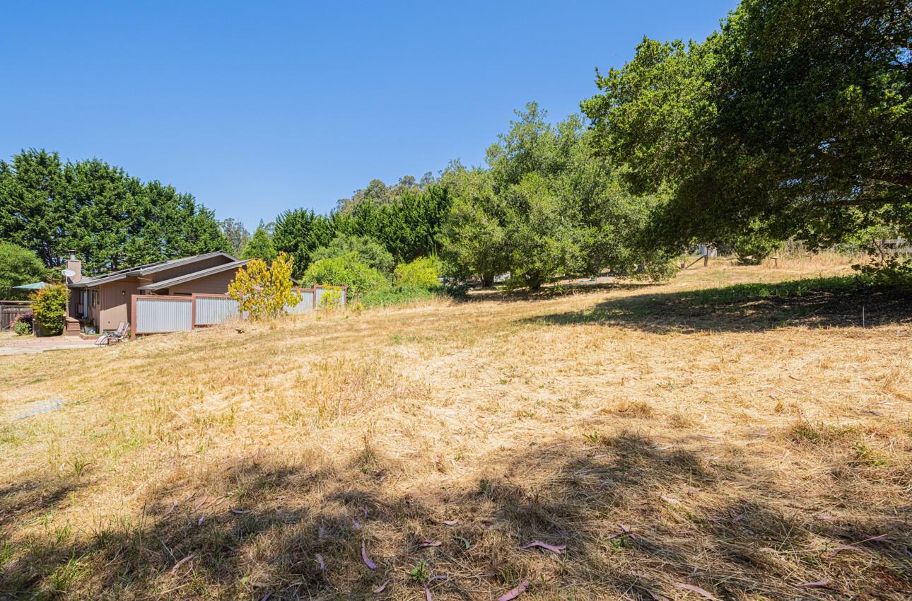5240 Strong Circle Watsonville, CA 95076 - Photo 49 of 51 a view of a yard with a house and wooden fence