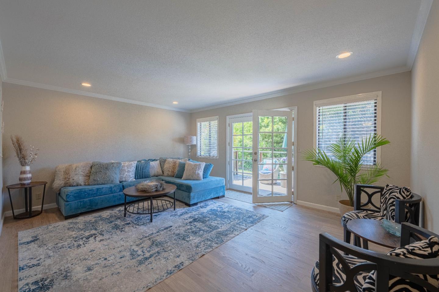 5240 Strong Circle Watsonville, CA 95076 - Photo 7 of 51 a living room with furniture plant and wooden floor