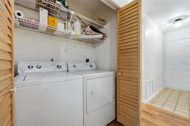 a utility room with dryer and washer