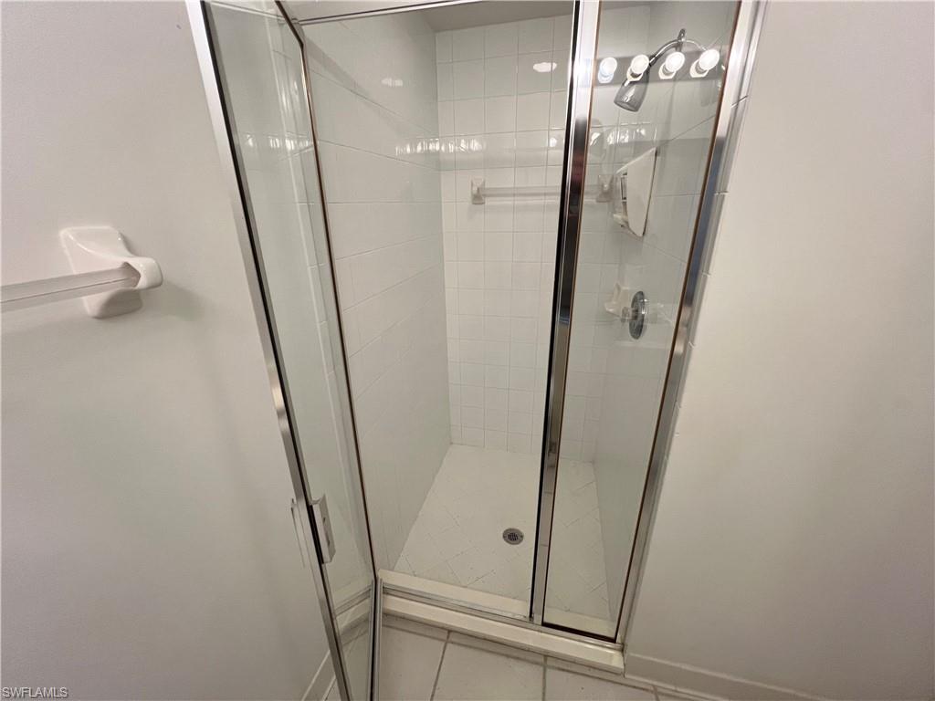 2081 Crestview Way, Unit A7 Naples, FL 34119 - Photo 22 of 33 a bathroom with a shower and toilet
