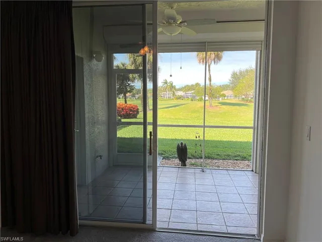 a view of a house with a garden