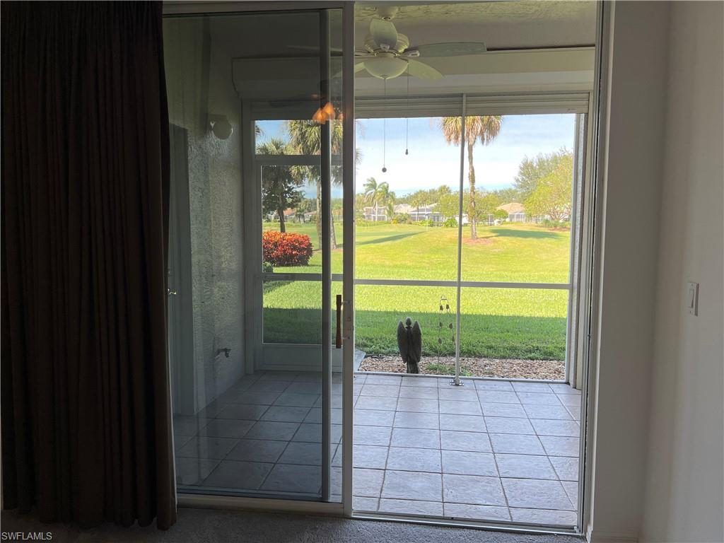 2081 Crestview Way, Unit A7 Naples, FL 34119 - Photo 31 of 33 a view of empty room with window