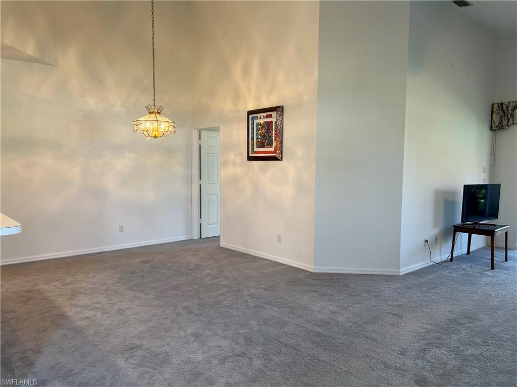 2081 Crestview Way, Unit A7 Naples, FL 34119 - Photo 8 of 33 a view of an empty room