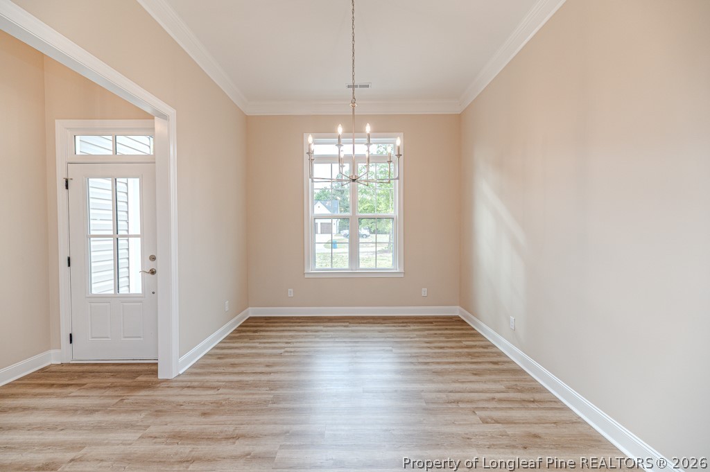 261 River Falls Road Sanford, NC 27332 - Photo 7 of 28 Formal Dining Room with high ceilings