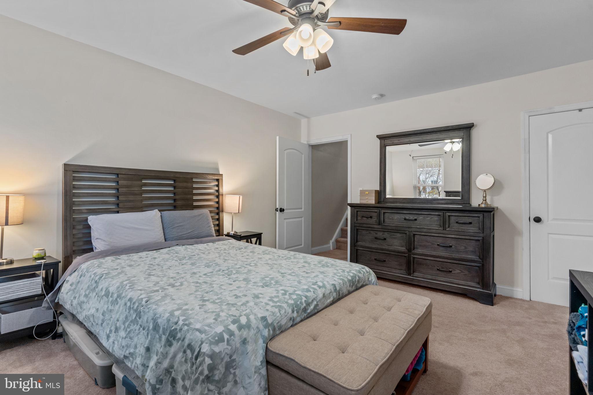 3554 New Queen Street Philadelphia, PA 19129 - Photo 17 of 39 a bedroom with a bed and a dresser in it