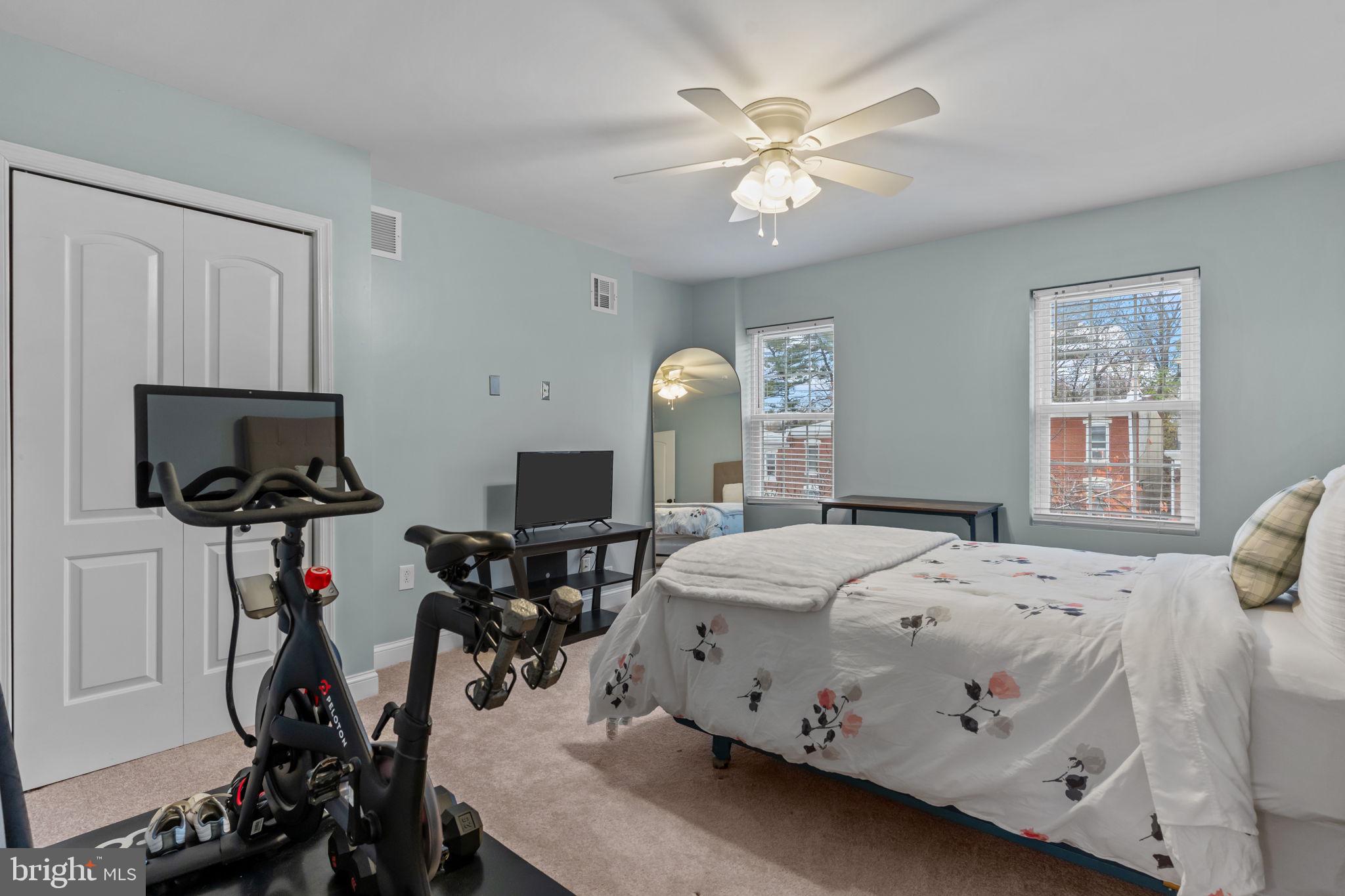 3554 New Queen Street Philadelphia, PA 19129 - Photo 24 of 39 a bedroom with a bed and a flat screen tv