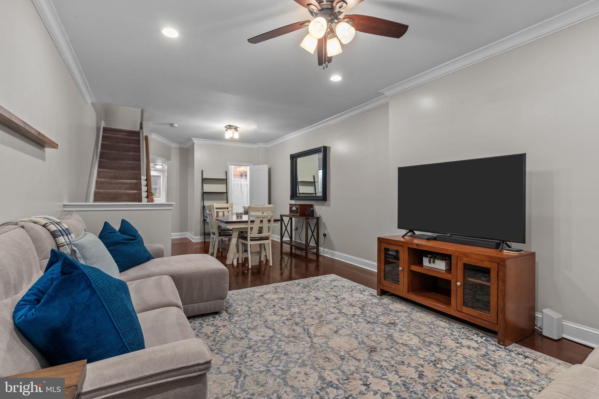3554 New Queen Street Philadelphia, PA 19129 - Photo 4 of 39 a living room with furniture and a flat screen tv