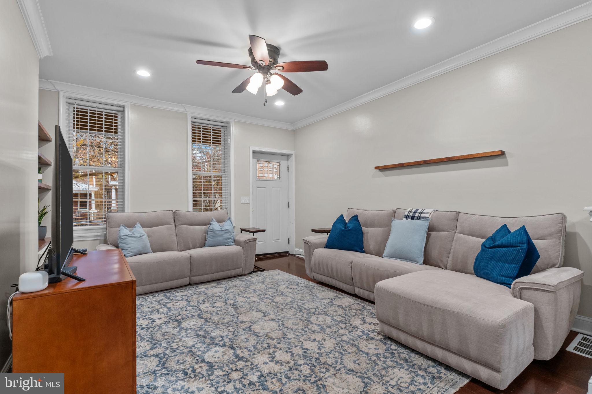 3554 New Queen Street Philadelphia, PA 19129 - Photo 6 of 39 a living room with furniture and a large window