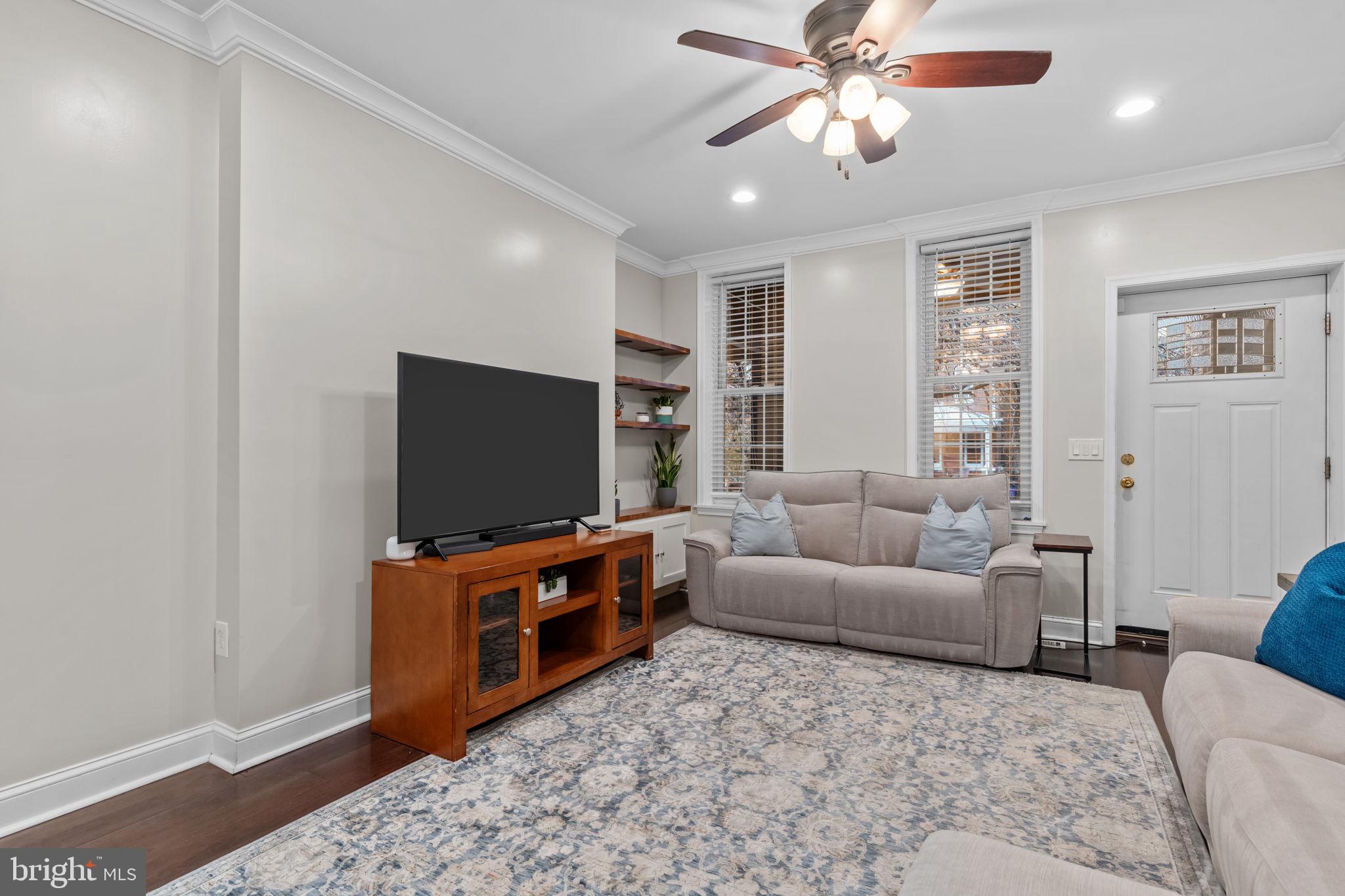 3554 New Queen Street Philadelphia, PA 19129 - Photo 7 of 39 a living room with furniture and a flat screen tv