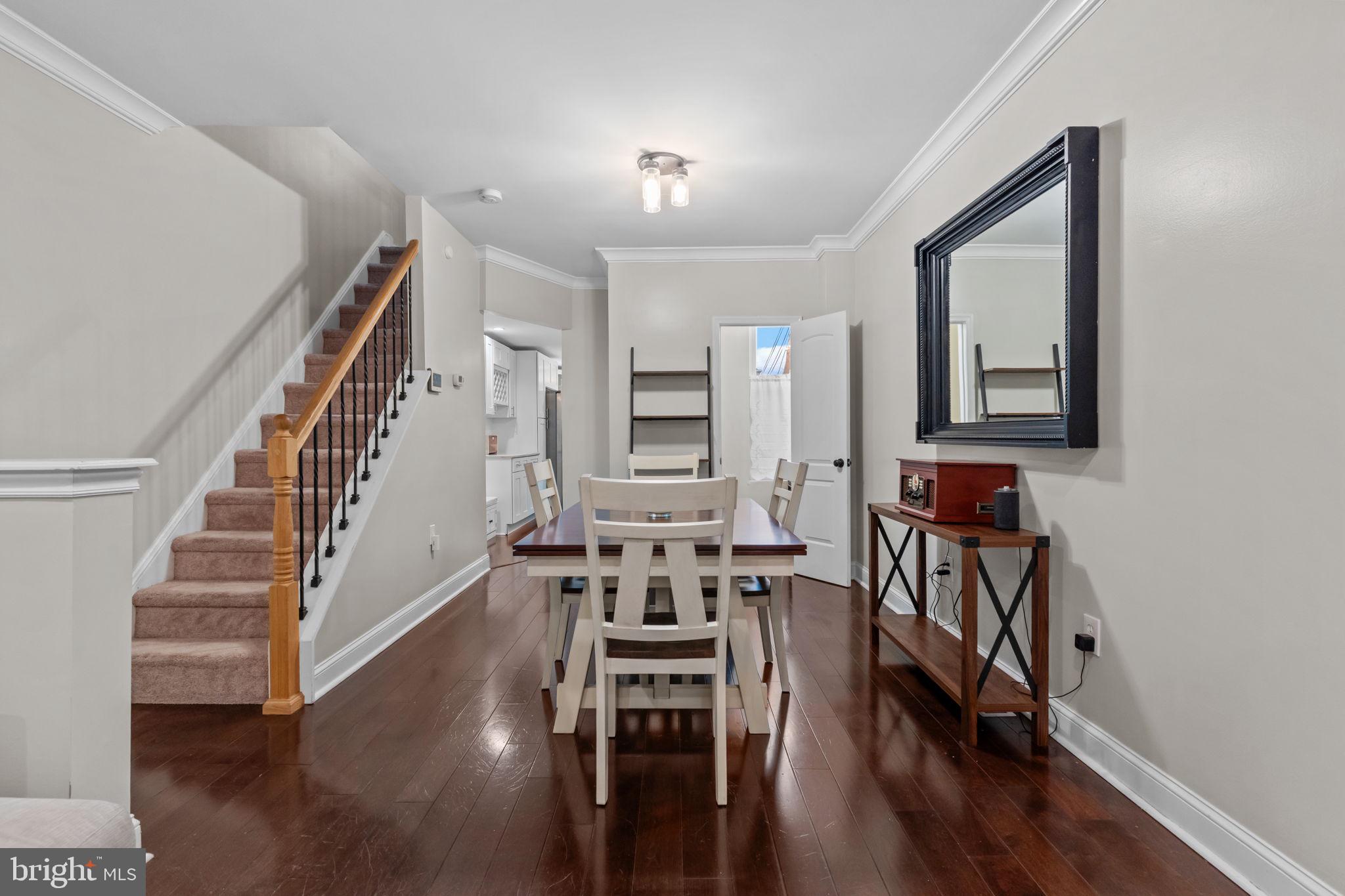 3554 New Queen Street Philadelphia, PA 19129 - Photo 8 of 39 a view of a livingroom with furniture hardwood floor and hallway