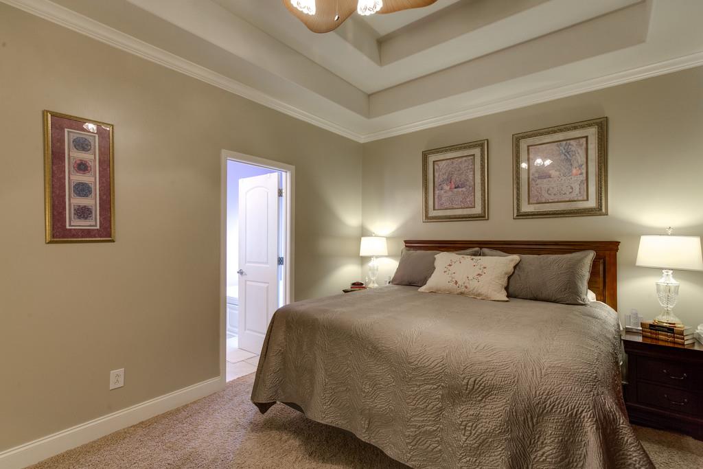 403 Coker Ford Road Portland, TN 37148 - Photo 14 of 29 a bed room with a bed and a night stand