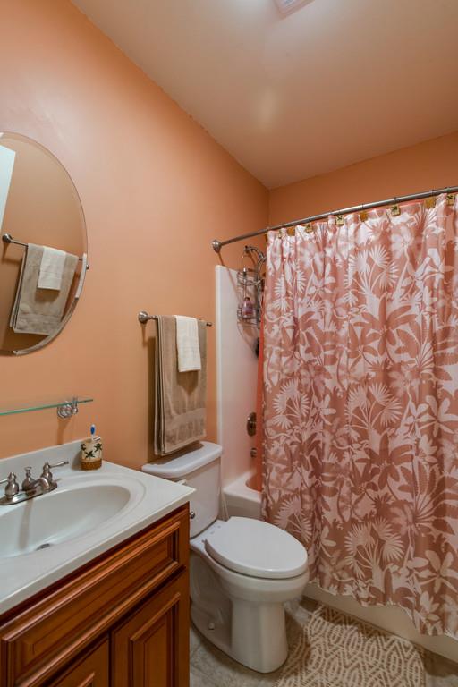 403 Coker Ford Road Portland, TN 37148 - Photo 19 of 29 a bathroom with a sink toilet and mirror