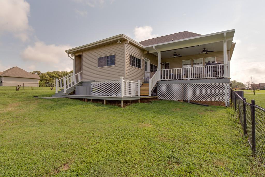 403 Coker Ford Road Portland, TN 37148 - Photo 25 of 29 a front view of a house with garden