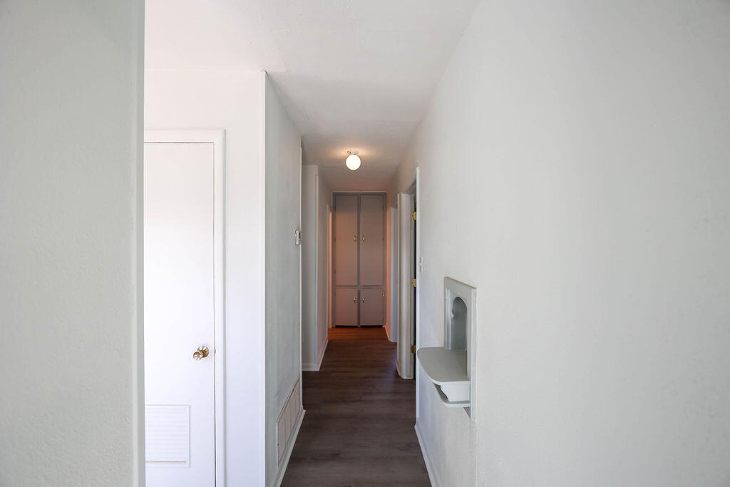 532 54th Street Lubbock, TX 79404 - Photo 15 of 19 a view of a hallway with a white walls