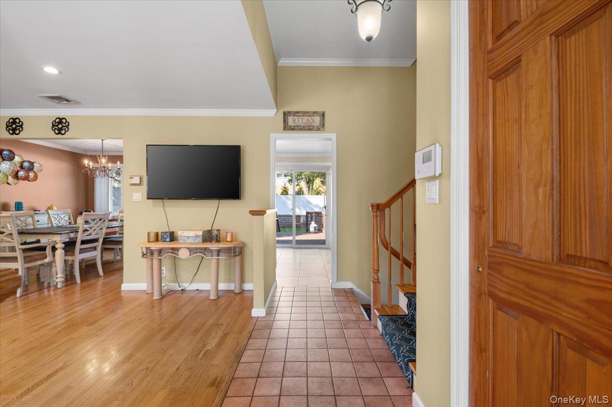 21 Eleanor Road Plainview, NY 11803 - Photo 2 of 39 a view of a living room with furniture and flat screen tv
