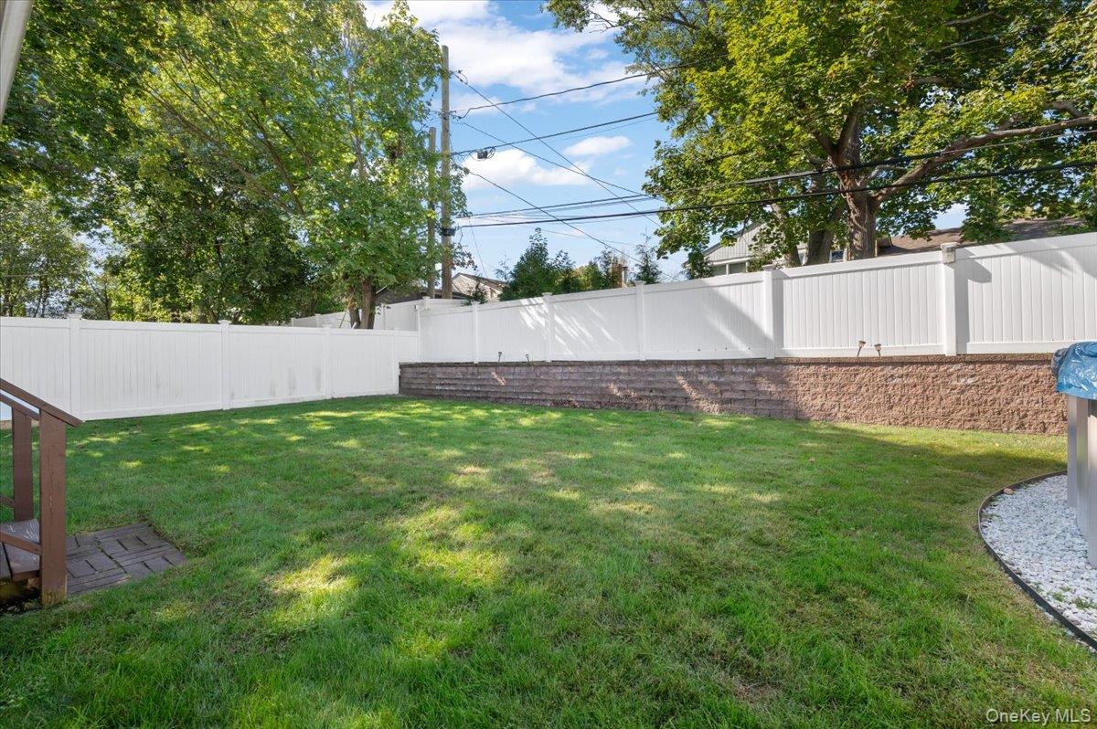 21 Eleanor Road Plainview, NY 11803 - Photo 29 of 39 a view of yard with green space