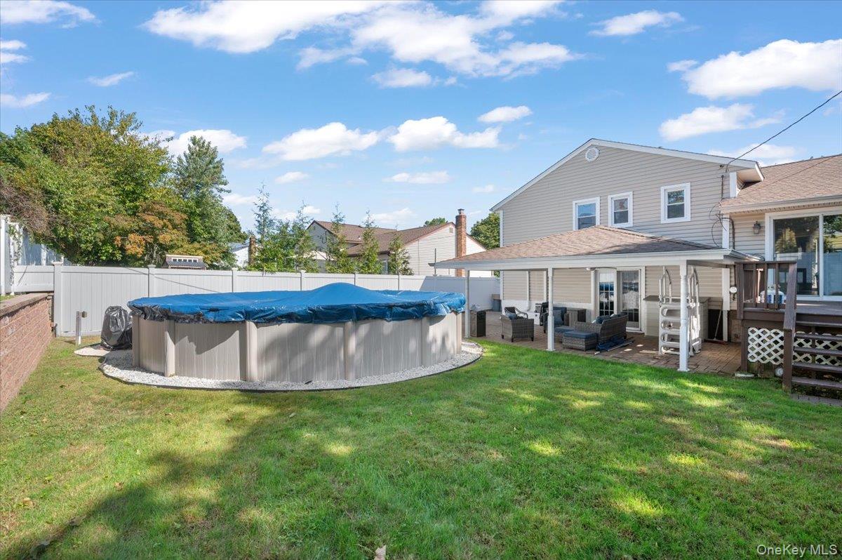 21 Eleanor Road Plainview, NY 11803 - Photo 32 of 39 a view of a house with a yard balcony and sitting area