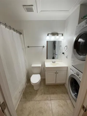 a view of a washer and dryer in a utility room