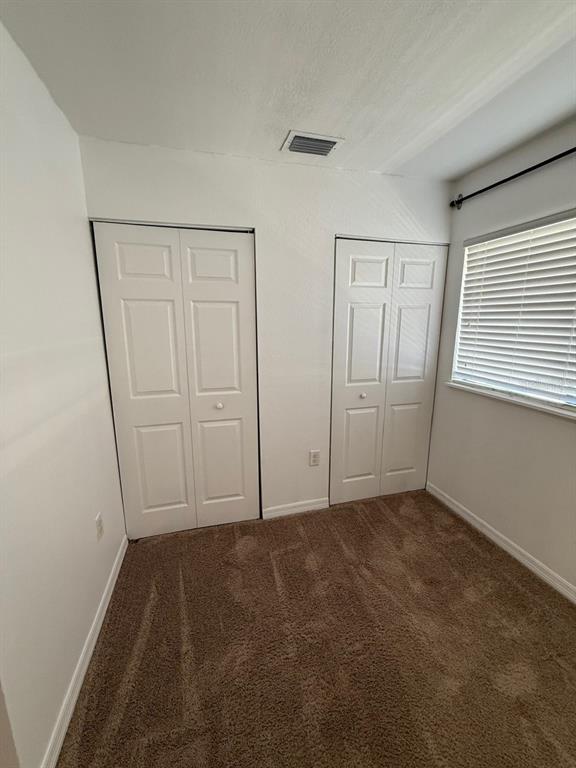 22710 Watersedge Boulevard, Unit 73 Land O' Lakes, FL 34639 - Photo 22 of 39 wooden floor in an empty room