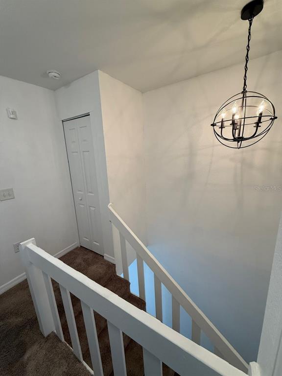 22710 Watersedge Boulevard, Unit 73 Land O' Lakes, FL 34639 - Photo 23 of 39 a view of a hallway with windows