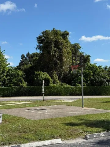a view of outdoor space yard and swimming pool