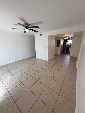 a view of a livingroom and entryway
